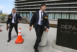 FBI agents leave the headquarters of the Los Angeles Department of Water and Power, July 22, 2019.