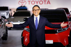 Toyota Motor Corp. President Akio Toyoda gestures for photographers during a press conference regarding battery EV strategies Tuesday, Dec. 14, 2021, in Tokyo.