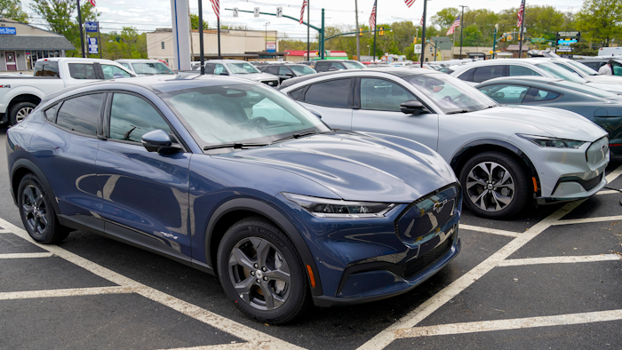 A pair of 2021 Ford Mustang Mach E displayed at a Ford dealer, Wexford, Pa., May 6, 2021.