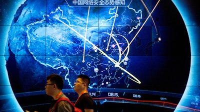 Electronic display showing recent cyberattacks in China at the China Internet Security Conference, Beijing, Sept. 12, 2017.