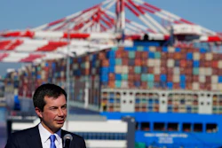 Transportation Secretary Pete Buttigieg speaks during a news conference to discuss the supply chain issues at the Port of Long Beach in Long Beach, Calif., Tuesday, Jan. 11, 2022.