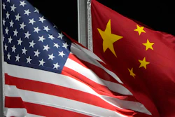 American and Chinese flags wave at Genting Snow Park, Zhangjiakou, China, Feb. 2, 2022.