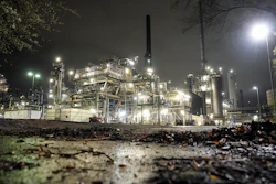 A refinery is illuminated in Gelsenkirchen, Germany, Tuesday evening, April 5, 2022. European governments were poised to ban on Russian coal imports despite the near-certainty of higher utility bills and inflation. But the limited energy sanction only underlined inability to agree on a much more sweeping ban on oil and gas that would hit Russia much harder but risk inflation and recession at home.
