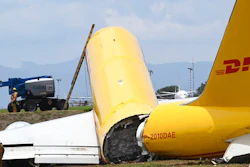 A cargo jet that spun off lays broken on the runway of the Juan Santamaria International Airport in Alajuela, Costa Rica, Thursday, April 7, 2022. According to the fire department, both the pilot and the co-pilot are reported in good health, and accident caused the total closure of the air terminal.