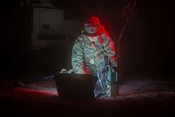 A U.S. military transmissions system operator establishes communications using a multi-band-networking-manpack. The Protected Tactical Enterprise Service (PTES) will provide ground-based Protected Tactical Waveform (PTW) processing, enabling secure operations and protected tactical communications coverage over Wideband Global SATCOM (WGS) satellites.