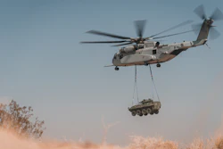 In this Aug. 21, 2021 photo, a CH-53K King Stallion with Marine Operational Test and Evaluation Squadron 1 conducts a lift of an external cargo load during a cargo loading and transporting exercise at Marine Corps Air Ground Combat Center, Twentynine Palms, California.