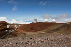 Telescopes are seen on the summit of Mauna Kea on Hawaii's Big Island, on Aug. 31, 2015. The National Science Foundation said Tuesday, July 19, 2022, that it plans to conduct a study to evaluate the environmental effects of building the Thirty Meter Telescope, one of the world's largest optical telescopes, on sites selected on Mauna Kea in Hawaii and Spain's Canary Islands.