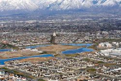 Homes in suburban Salt Lake City are shown, April 13, 2019. According to a new study released Monday, July 25, 2022, by the U.S. Census Bureau, by age 26 more than two-thirds of millennials lived in the same general area where they grew up, 80% had moved less than 100 miles away and 90% resided less than 500 miles away.