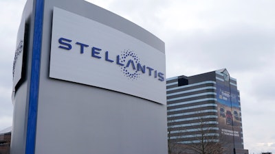 In this file photo taken on Jan. 19, 2021, the Stellantis sign is seen outside the Chrysler Technology Center, in Auburn Hills, Mich. U.S. safety regulators have opened three investigations into safety problems with about 1.65 million vehicles made by Stellantis, Tuesday, July 26, 2022. The largest probe covers 1.34 million Jeep Cherokee small SUVs from the 2014 through 2020 model years.