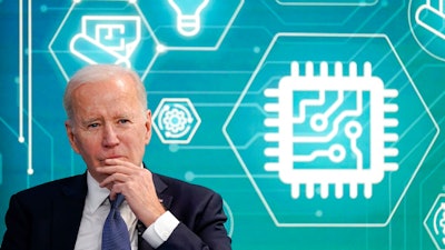 President Joe Biden attends an event to support legislation that would encourage domestic manufacturing and strengthen supply chains for computer chips in the South Court Auditorium on the White House campus, March 9, 2022, in Washington. A bill to boost semiconductor production in the United States is making its way through the Senate and is a top priority of the Biden administration. It would subsidize computer chip manufacturers through grants and tax breaks when they build or expand chip plants in the U.S.