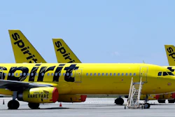 A line of Spirit Airlines jets sit on the tarmac at the Orlando International Airport on May 20, 2020, in Orlando, Fla. Spirit announced on Thursday, July 7, 2022, that it would again postpone a vote on the proposed merger with Frontier, a sign that it lacks shareholder support for the merger in the face of a rival bid by JetBlue Airways. Spirit delayed the vote by a week, until July 15.