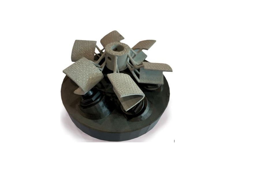 A 3D-printed fixturing system using Blue Photon grippers and BlueGrip workholding adhesive to hold an additive impeller part for post-processing.
