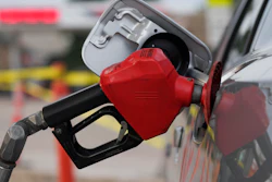 A motorist fills up the tank on a sedan, Saratoga, Wyo., July 22, 2022.