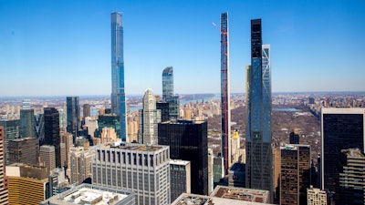 Four residential skyscrapers tower over the skyline south of Central Park in the Manhattan borough of New York City on Friday, Feb. 26, 2021. From left, Central Park Tower, One57, Steinway Tower and the MoMA Expansion Tower. One skyscraper stands out from the rest in the Manhattan skyline. It's not the tallest, but it is the skinniest — the world's skinniest, in fact. The 84-story residential Steinway Tower, designed by New York architecture firm SHoP Architects, has the title of “most slender skyscraper in the world” thanks to its logic-defying ratio of width to height: 23 1/2-to-1.