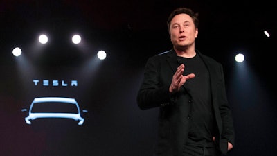 Tesla CEO Elon Musk speaks before unveiling the Model Y at the company's design studio on March 14, 2019, in Hawthorne, Calif. Musk is selling about 8 million Tesla shares worth nearly $7 billion as the billionaire looks to get his finances in order ahead of his court battle with Twitter.