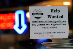 Hiring sign at a restaurant in Highland Park, Ill., July 14, 2022.