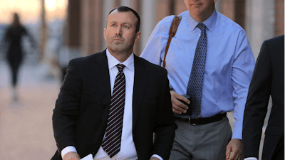 eBay former Senior Director of Safety and Security James Baugh arrives for his sentencing in a cyber stalking case at Moakley Federal Court on Thursday, Sept. 29, 2022, in Boston.
