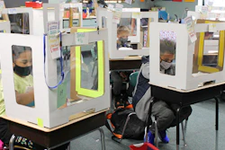 In this Oct. 19, 2020, file photo Michigan City, Ind., area school students return for in-person instruction after two months of remote learning to start the new school year.