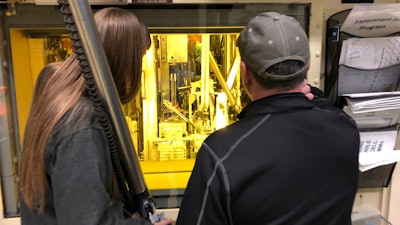 Hot cell operators Dawnette Hunter, left, and Scot White manipulate radioactive material from behind 4-foot-thick leaded glass at the Hot Fuel Examination Facility at the Idaho National Laboratory, about 50 miles west of Idaho Falls, Idaho, on Nov. 29, 2018.