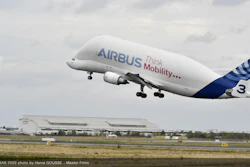 Beluga taking off with special cargo Hotbird13G.