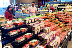 Shoppers shop at a grocery store in Glenview, Ill., Monday, July 4, 2022. Consumers spent a bit more in August than the previous month, a sign the economy is holding up even as inflation lifts prices for food, rent, and other essentials. Americans boosted their spending at stores and for services such as haircuts by 0.4% in August, after it fell 0.2% in July, the Commerce Department said Friday Sept. 30.
