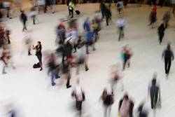 In this June 15, 2017 photo, people walk inside the Oculus in New York. Google has agreed to a $391.5 million settlement with 40 states in connection with an investigation into how the company tracked users’ locations.