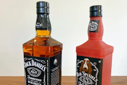 A bottle of Jack Daniel's Tennessee Whiskey is displayed next to a Bad Spaniels dog toy in Arlington, Va., Sunday, Nov. 20, 2022. Jack Daniel's has asked the Supreme Court justices to hear its case against the manufacturer of the toy.