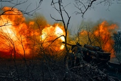Ukrainian soldiers fire an artillery at Russian positions near Bakhmut, Donetsk region, Ukraine, Sunday, Nov. 20, 2022.