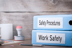 Work Safety And Safety Procedures Two Binders On Desk In The Office Business Background 646371110 3916x2549