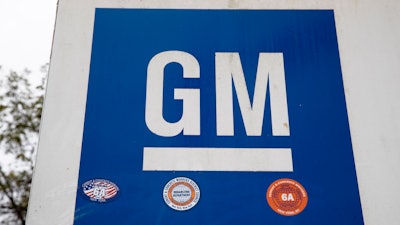 This Oct. 16, 2019, file photo shows a sign at a General Motors facility in Langhorne, Pa.