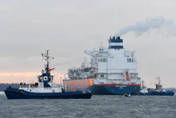 Floating Storage Regasification Unit (FSRU) ship 'Hoegh Esperanza' is guided by tug boats during its arrival at the port of Wilhelmshaven, Germany, Thursday, Dec, 15, 2022.