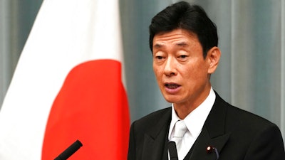 Then Economic revitalization minister, Yasutoshi Nishimura speaks during a press conference in Tokyo Wednesday, Sept. 11, 2019. Nishimura told reporters Tuesday, Dec. 6, 2022, that the new company, Rapidus, which was launched last month by eight corporate giants including automakers, electronics and chipmakers, will team up with the Imec, a Leuven, Belgium-based research organization known for the nanoelectronics and digital technologies key to developing next-generation chips.