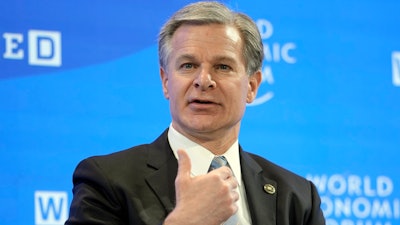 FBI Director Christopher Wray talks at the World Economic Forum in Davos, Switzerland Thursday, Jan. 19, 2023.