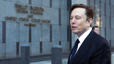 Elon Musk departs the Phillip Burton Federal Building and United States Court House in San Francisco, on Tuesday, Jan. 24, 2023. Tesla has received requests from the Justice Department for documents related to its Autopilot and “Full Self-Driving” features, according to a regulatory filing.