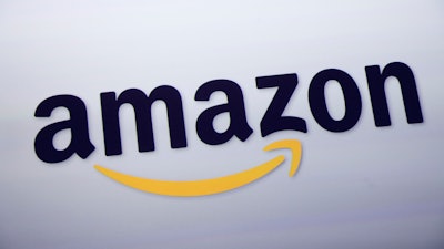he Amazon logo is displayed at a news conference in New York on Sept. 28, 2011.