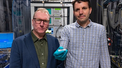 Dr Andy Boes from the University of Adelaide's Institute of Photonics and Advanced Sensing (right) and RMIT University’s Distinguished Professor Arnan Mitchell.