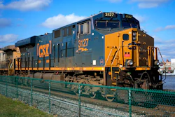 A CSX freight train sits on a siding in downtown Pittsburgh, Nov. 19, 2022. CSX railroad has promised to give more of its workers the paid sick time they demanded in contract negotiations last fall. CSX is the only major freight railroad so far to agree to give its employees sick time in the wake of the contentious negotiations that ended only after Congress stepped in to block a potential strike.
