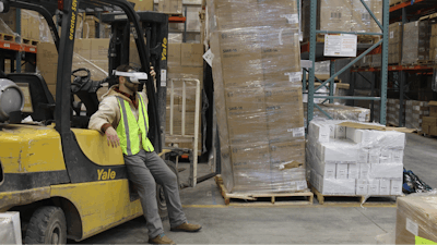 A worker wearing a new real-time impairment screening device for cannabis and other drugs designed by Gaize.