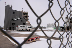 The Denver Fire Academy is visible through a fence from the road Thursday, Feb. 23, 2023, in Commerce City, Colo. Firefighting foam used here up until 2018 is suspected to be linked to the discovery of PFAS, or “forever chemicals” found in city’s groundwater.