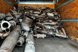 This photo provided by the Phoenix Police Department shows stolen catalytic converters that were recovered after detectives served a search warrant at a storage unit in Phoenix, May 27, 2022.