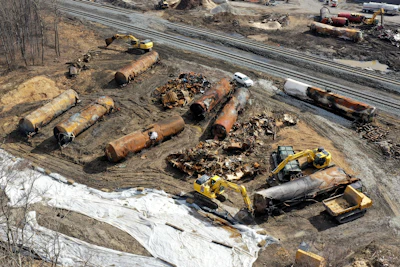 A view of the scene on Feb. 24, 2023, as the cleanup continues at the site of of a Norfolk Southern freight train derailment that happened on Feb. 3 in East Palestine, Ohio. The fire that erupted after last month's train derailment in Ohio melted a key part of the tank cars filled with toxic chemicals, so federal officials warned railcar owners Thursday, March 2, 2023, to check their fleets for similar flaws.