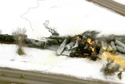 This photo provided KSTP, emergency personnel respond to the scene of a train derailment early Thursday, March 30, 2023 in Raymond, Min.