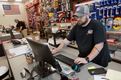 Fww Store Employee At Computer