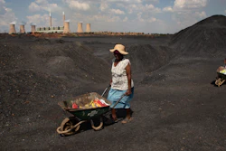 Women push wheelbarrows atop a coal mine dump at the coal-powered Duvha power station, near Emalahleni east of Johannesburg, Nov. 17, 2022. Humanity still has a chance, close to the last one, to prevent the worst of climate change’s future harms, a top United Nations panel of scientists said Monday, March 20, 2023. But doing so requires quickly slashing carbon pollution and fossil fuel use.