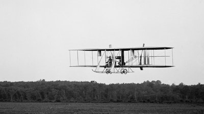 The Wright Brothers airplane being tested. Their plane was the first Military Plane Purchased by US. Biplane circa 1910.