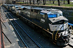 A Norfolk Southern freight train rolls through downtown Pittsburgh, March 26, 2018.