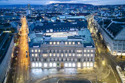 The headquarters of Swiss banks Credit Suisse, center, and UBS, left, in Zurich, March 19, 2023.