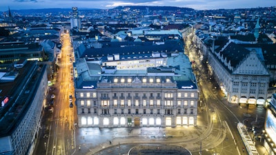 The headquarters of Swiss banks Credit Suisse, center, and UBS, left, in Zurich, March 19, 2023.