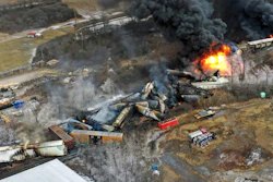 In this photo taken with a drone, portions of a Norfolk Southern freight train that derailed the previous night in East Palestine, Ohio, remain on fire at mid-day, Feb. 4, 2023. The Pipelines and Hazardous Materials Safety Administration proposed a new rule Wednesday, June 21, that would require all railroads to quickly provide the details of everything aboard their trains electronically to every emergency responder within 10 miles of a derailment.