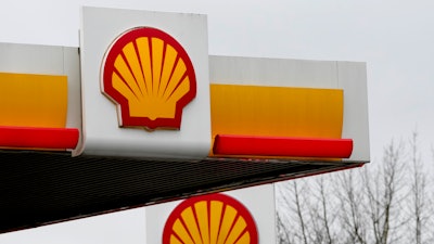 Signs at a shell petrol station in London, on Feb. 2, 2023.